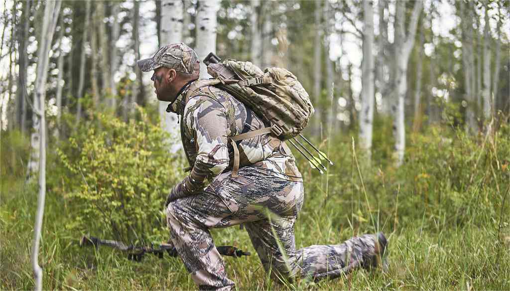 a hunter wears brand hunting clothing